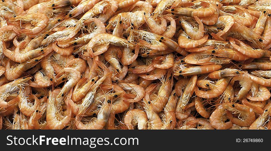 Boiled shrimps for sale at a market.