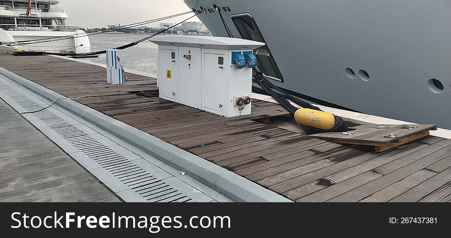 Ship supply machine on wood pier