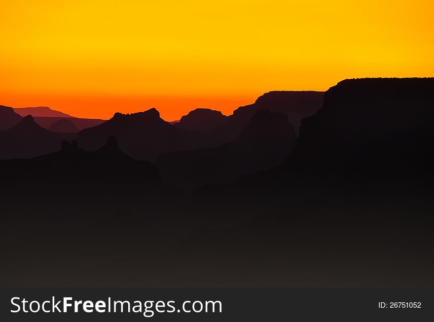 Grand canyon orange and yellow silhouette sunset, Arizona, USA