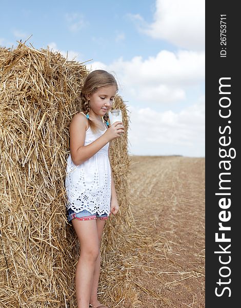 Girl with a glass of milk