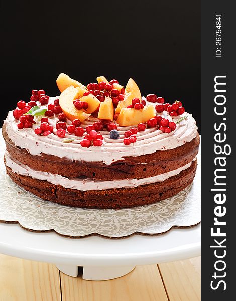 Chocolate layer cake with mascarpone and fruits. Chocolate layer cake with mascarpone and fruits