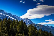 Snow Covered Mountains And Rocky Peaks In The Alps Stock Images Snow Covered Mountains And Rocky Peaks In The Alps Stock Images