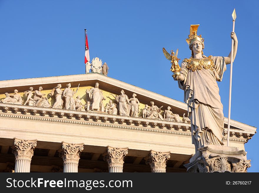 The Austrian Parliament and statue of Pallas Athena in Vienna, Austria. The Austrian Parliament and statue of Pallas Athena in Vienna, Austria