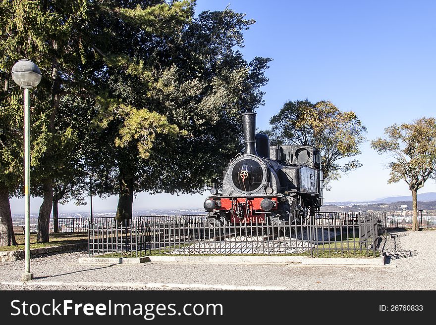 Old locomotive: monument to the state railways, Brescia, Italy