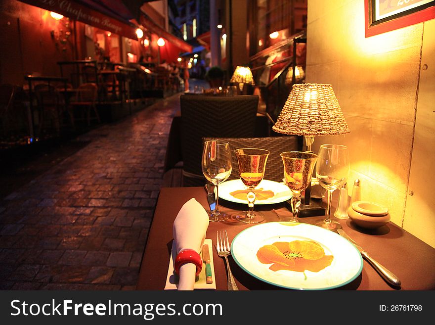 Night light decoration of the restaurant on the street in france