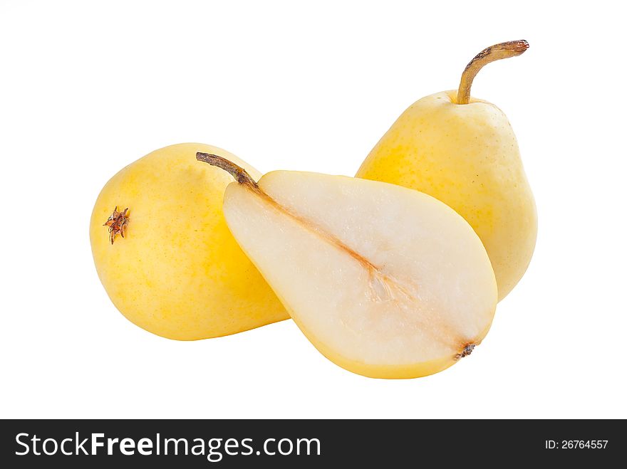 Whole and half ripe yellow pears isolated on white background. Whole and half ripe yellow pears isolated on white background