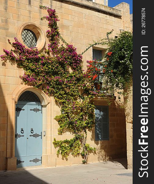 A pretty courtyard in the medieval walled city of Mdina. September 20, Mdina, Malta. A pretty courtyard in the medieval walled city of Mdina. September 20, Mdina, Malta.