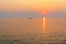 Boat In The Sea At Sunset. Royalty Free Stock Photos
