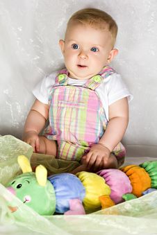 Astonished Infant With Toy Royalty Free Stock Image Astonished Infant With Toy Royalty Free Stock Image