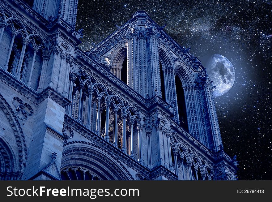 Notre-Dame cathedral of Paris at night, under the moonlight. Notre-Dame cathedral of Paris at night, under the moonlight.