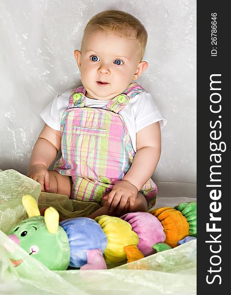 Astonished Infant With Toy