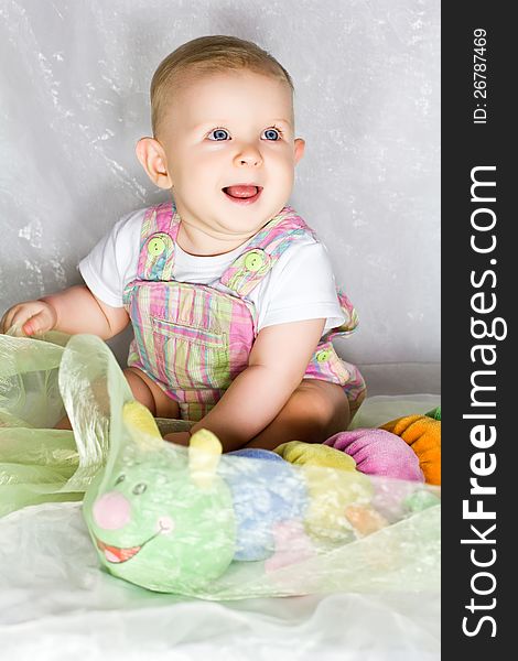 Little Girl With Toy Caterpillar