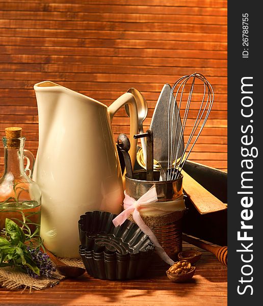 Old kitchen cooking utensil in rustic decor