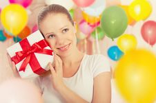 Young Woman With A Gift With Colorful Balloons Royalty Free Stock Photo Young Woman With A Gift With Colorful Balloons Royalty Free Stock Photo