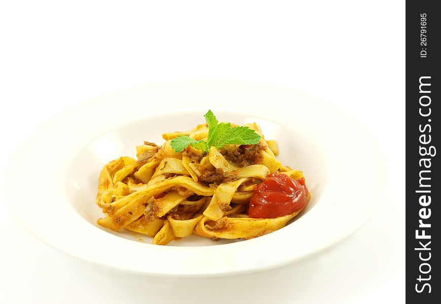 Pasta with meat sauce on towards white background