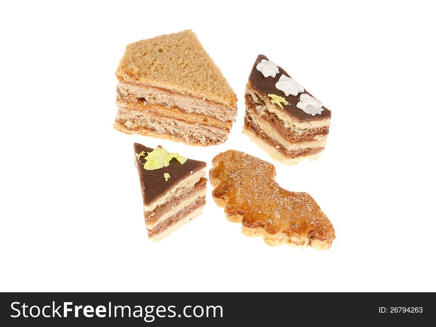 Delicious cakes on a white background. Isolated on a white.