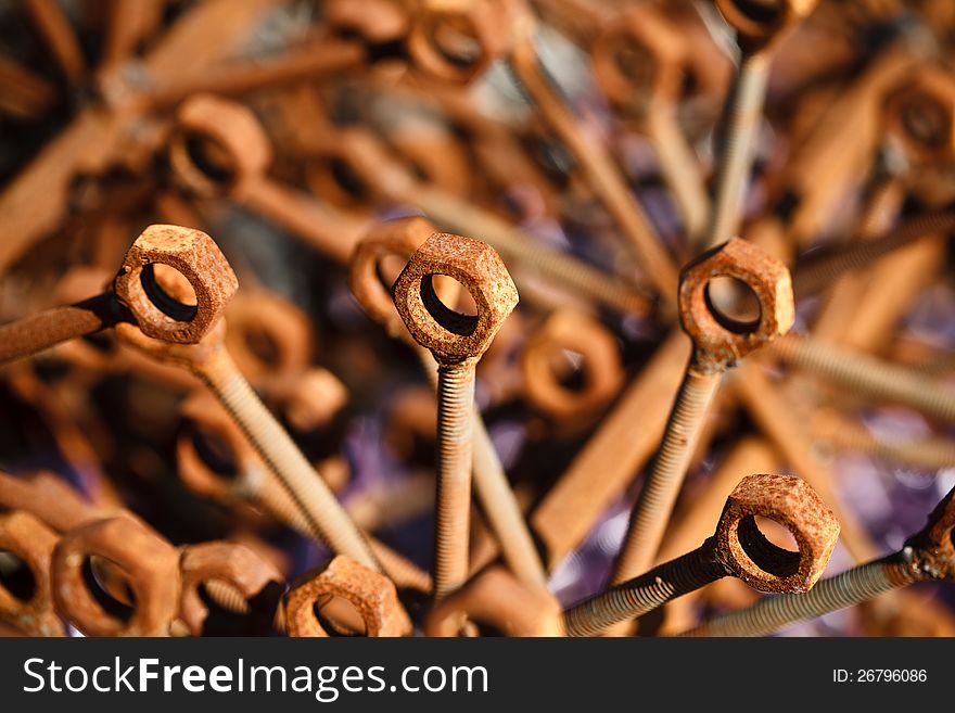 Many rusty nuts and bolts