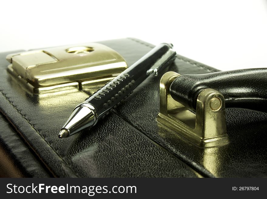 Briefcase in black leather with pen. Briefcase in black leather with pen