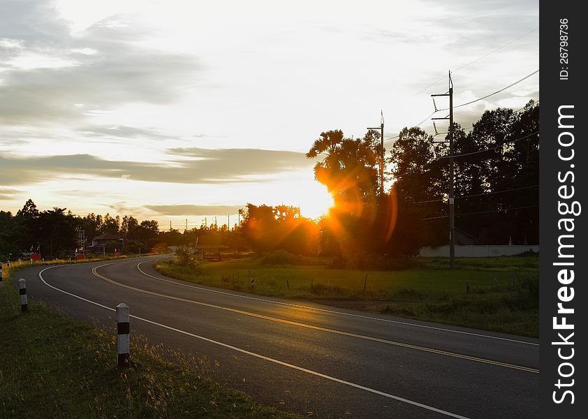 Light vehicles on the road in the evening. Light vehicles on the road in the evening.