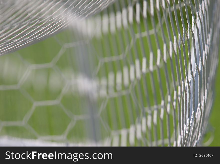 Photo of football net - from the goal. Photo of football net - from the goal
