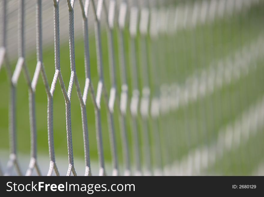 Photo of football net - from the goal. Photo of football net - from the goal