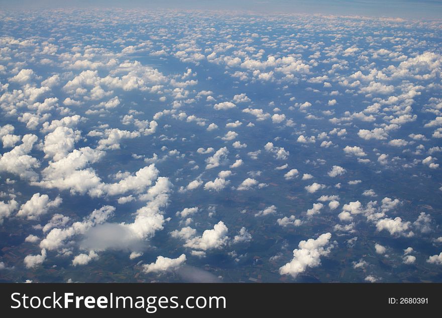 View on clouds from top airplane. View on clouds from top airplane