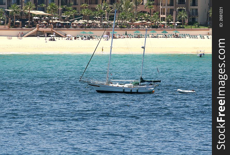 A nice sailing yacht anchored close to the beach. A nice sailing yacht anchored close to the beach