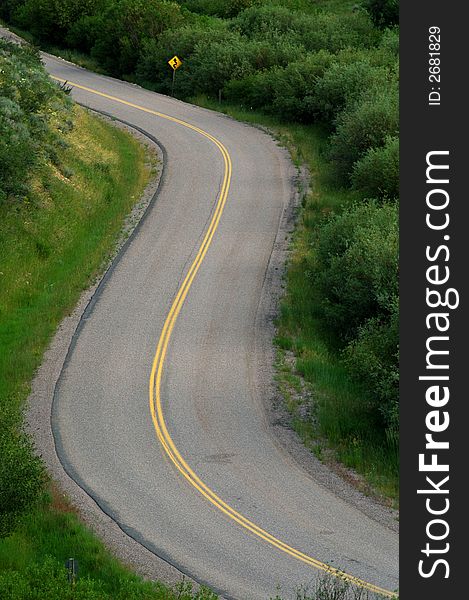 Country road with painted double yellow lines. Country road with painted double yellow lines