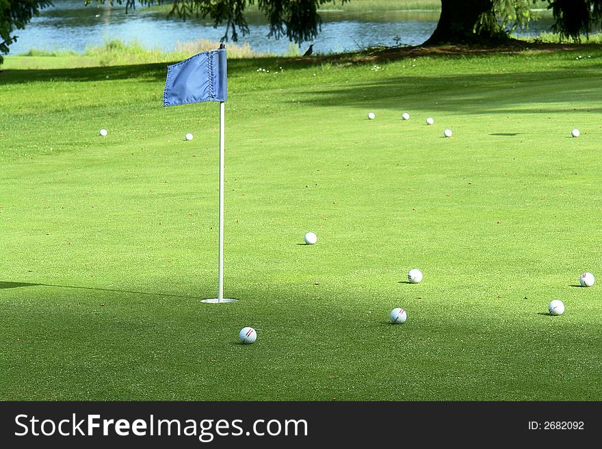 Practise putting green at a country club. Practise putting green at a country club