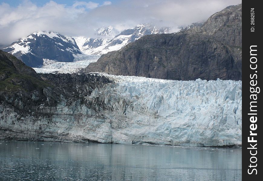 Glacier Bay, Alaska, looking at the face of the Margery Glacier and the mountains behind it. Glacier Bay, Alaska, looking at the face of the Margery Glacier and the mountains behind it