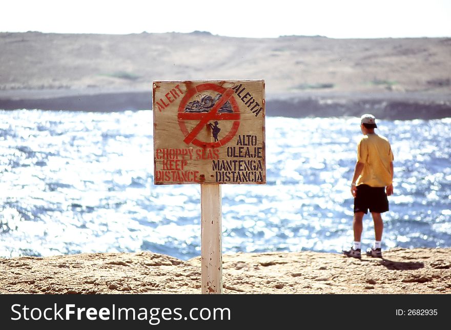 Choppy waters alert sign for swimmers. Choppy waters alert sign for swimmers.