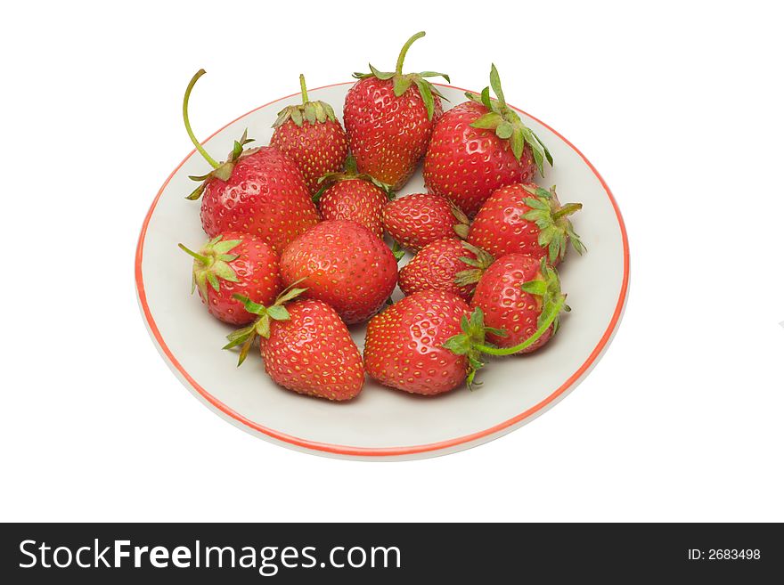 Strawberries on a saucer, isolated on white background, with clipping path in the file. Strawberries on a saucer, isolated on white background, with clipping path in the file