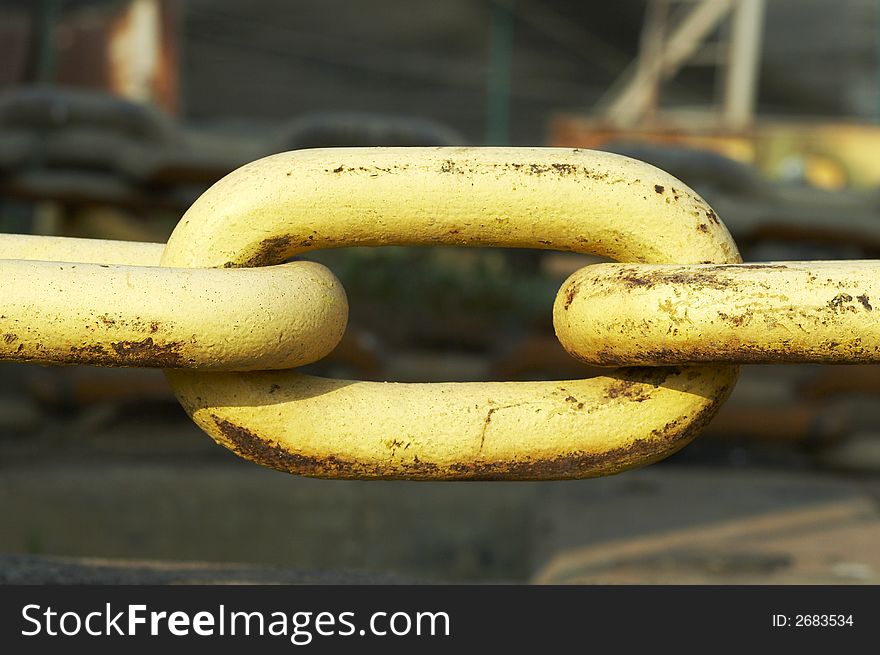 Close up of big yellow chain