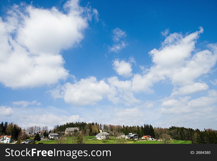 Beautiful landscape with cloudy sky and countryfield idyll. Beautiful landscape with cloudy sky and countryfield idyll