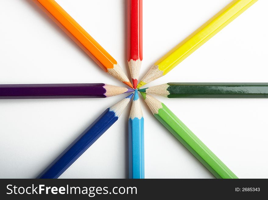 A Circle of Colored Pencils on White Background. A Circle of Colored Pencils on White Background