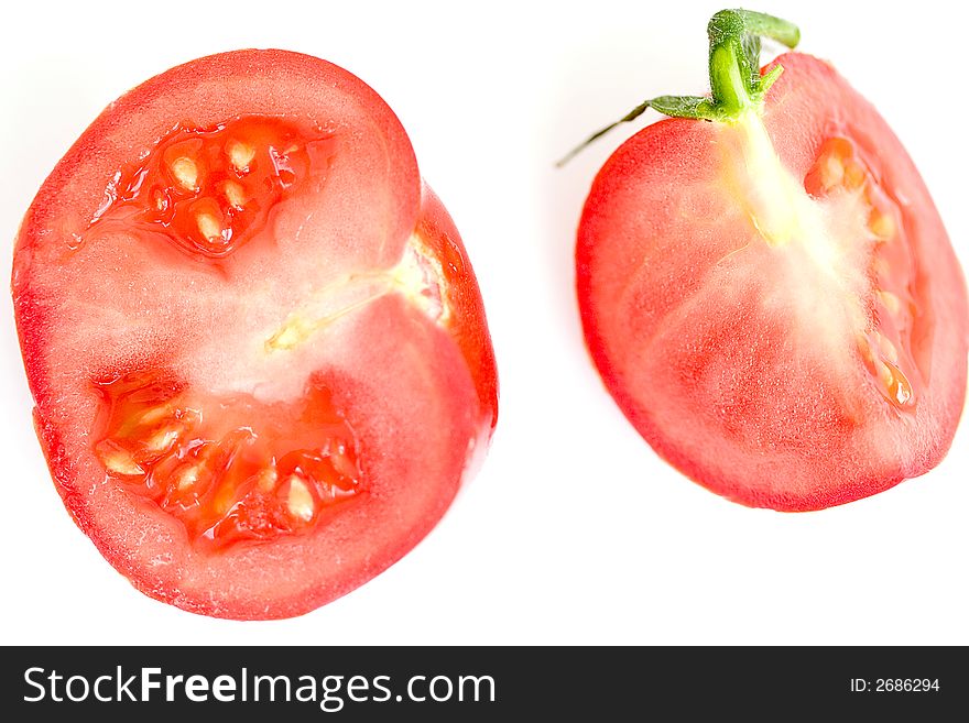 Pieces of tomato on white background,isolated. Pieces of tomato on white background,isolated