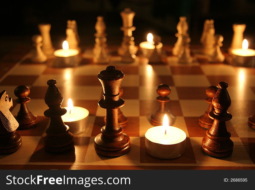 A game of chess at night