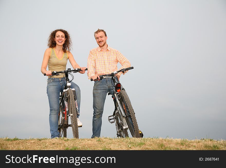 Man and woman on the bicycles. Man and woman on the bicycles