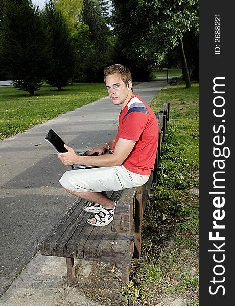 Young man with notebook