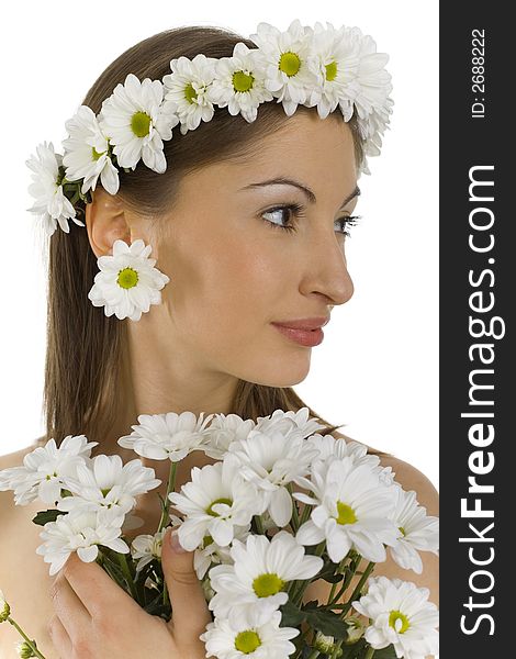 Young, beautiful and naked woman with bouquet of white flowers. White background, side view. Young, beautiful and naked woman with bouquet of white flowers. White background, side view