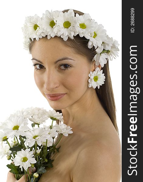 Young, beautiful and naked woman with bouquet of white flowers. White background, looking at camera. Side view. Young, beautiful and naked woman with bouquet of white flowers. White background, looking at camera. Side view