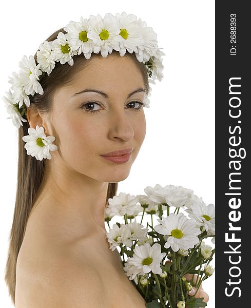 Young, beautiful and naked woman with bouquet of white flowers. White background, looking at camera. Side view. Young, beautiful and naked woman with bouquet of white flowers. White background, looking at camera. Side view