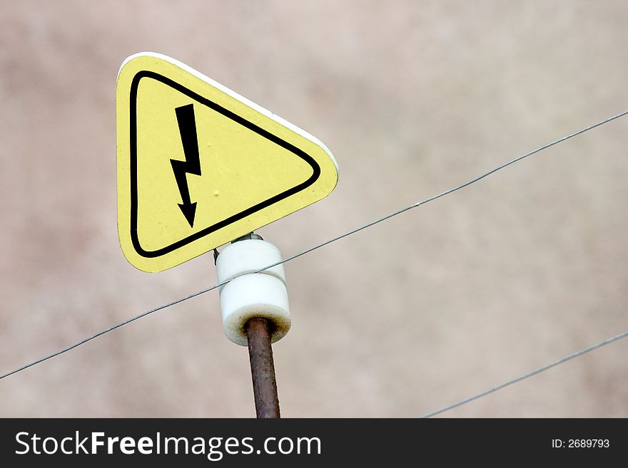 The sign of electric preassure