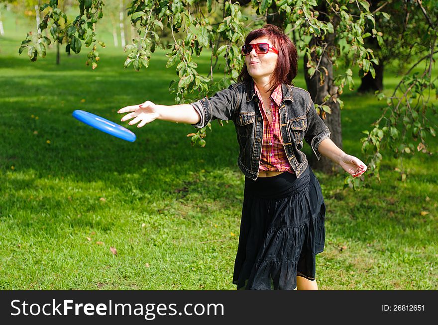Young Woman With Frisbee