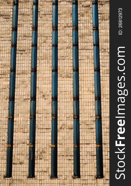 The wall of old office building with windows. The wall of old office building with windows