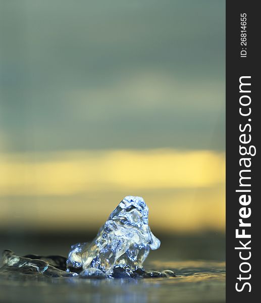 Close up of water splash in stunning light