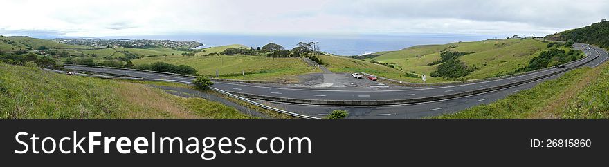 Australia, near Sidney. Panorama of ocean with road.