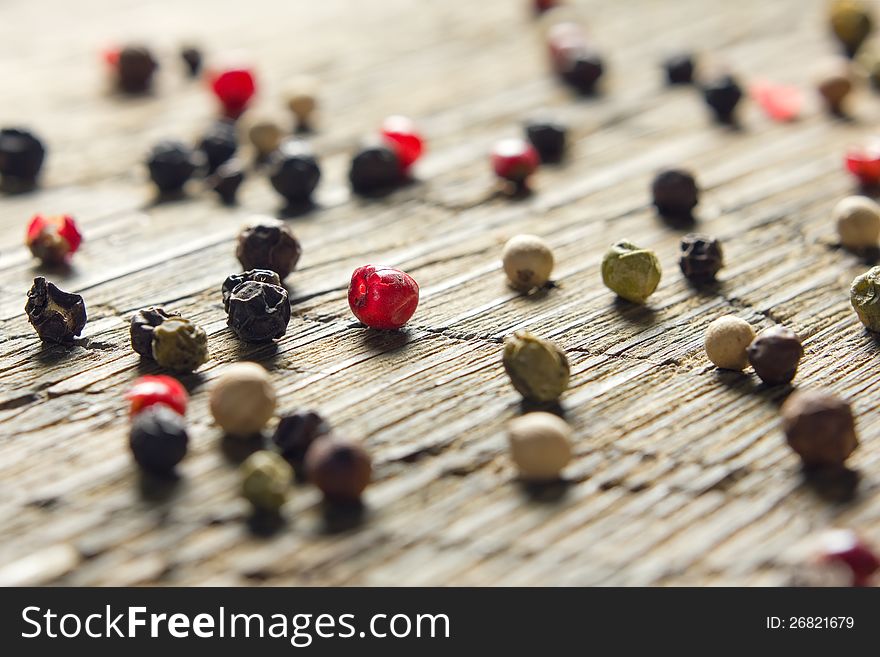 Peppercorn mix on vintage worn wooden table