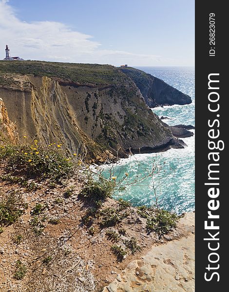 View of the beautiful lighthouse of Cape Espichel, Sesimbra, Portugal.