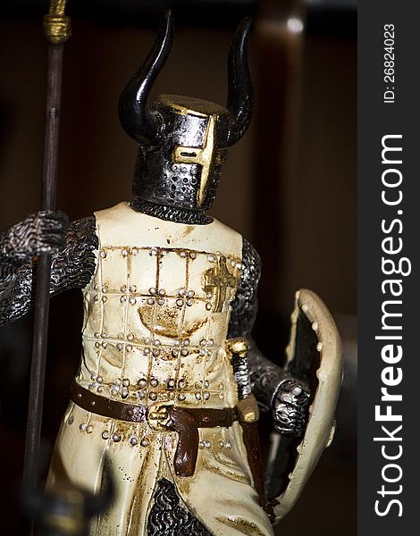 Macro view of a cool miniature medieval warrior. Macro view of a cool miniature medieval warrior.